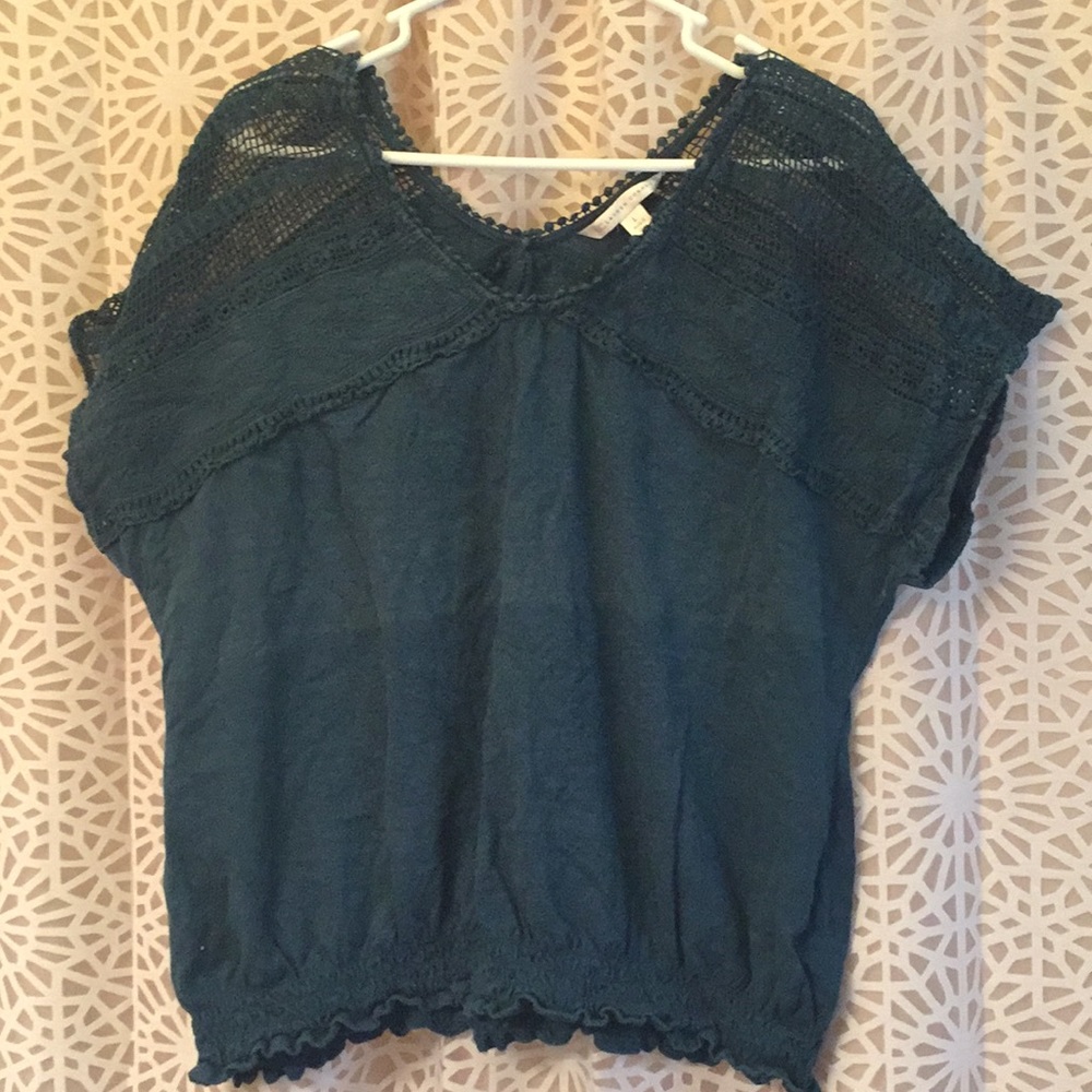 Ladies top with embellished sleeves